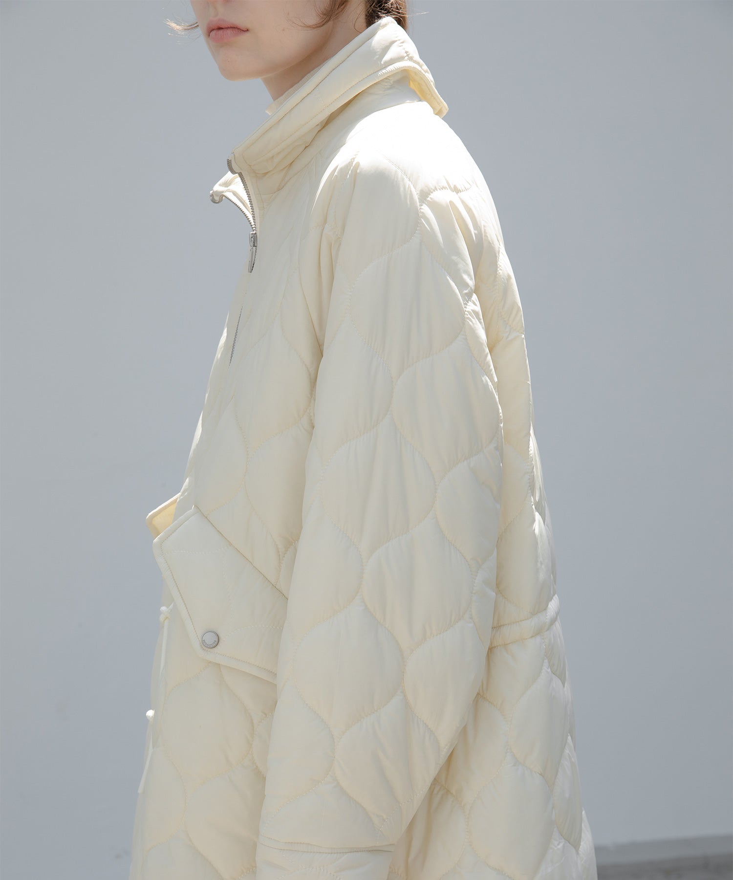 Irregular hem oversized volume quilted long coat