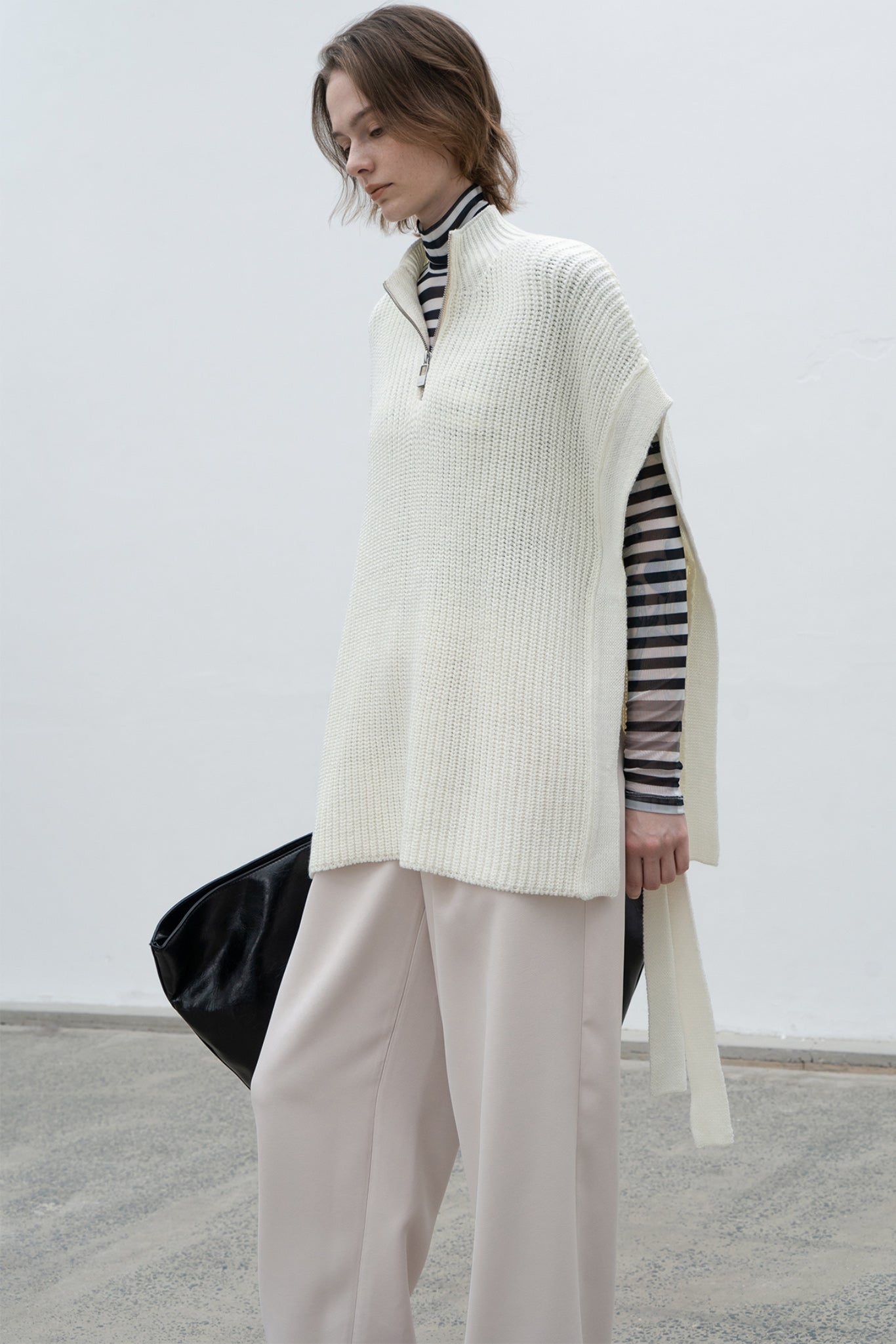 Stand collar high neck half zip up side open knit vest