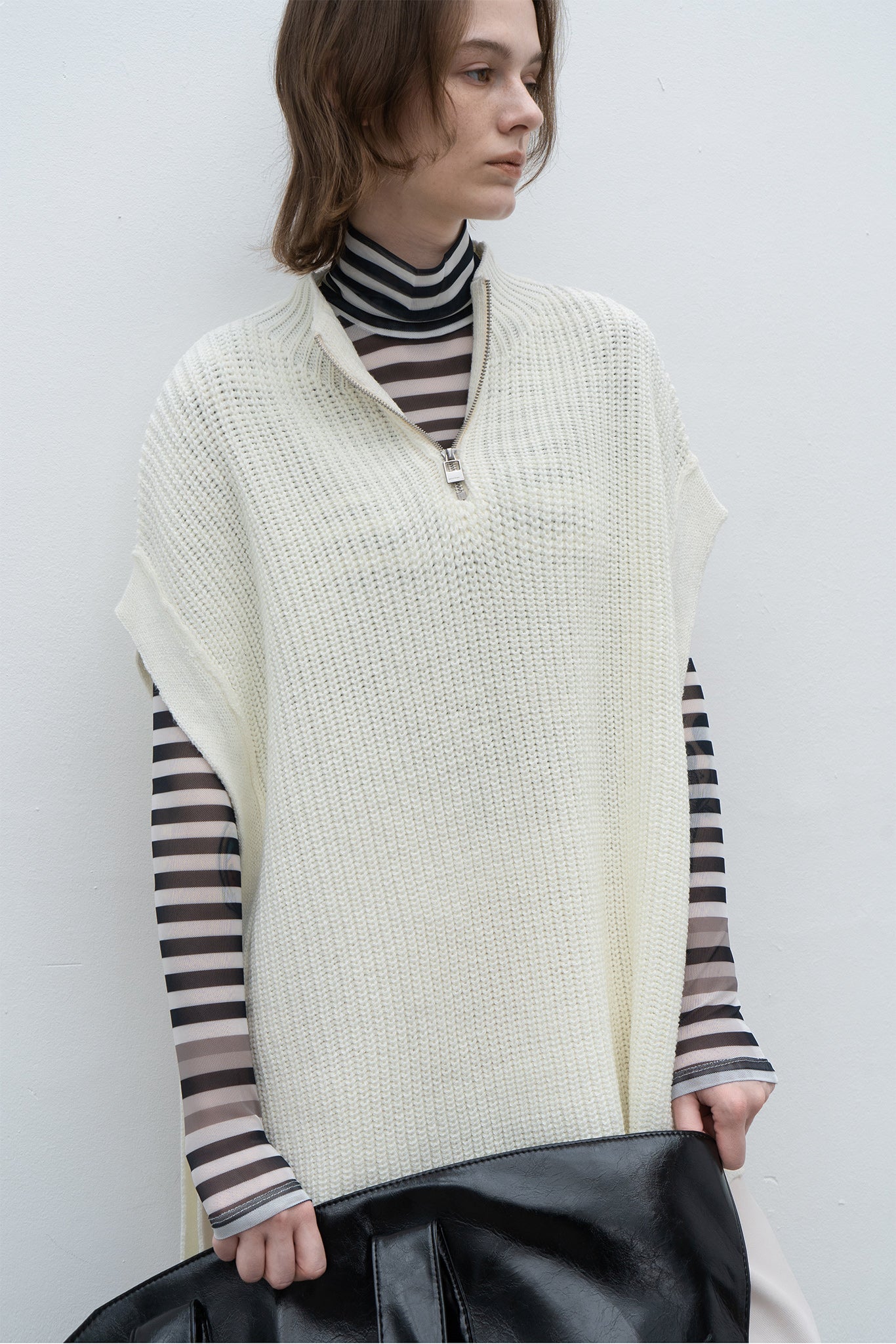 Stand collar high neck half zip up side open knit vest