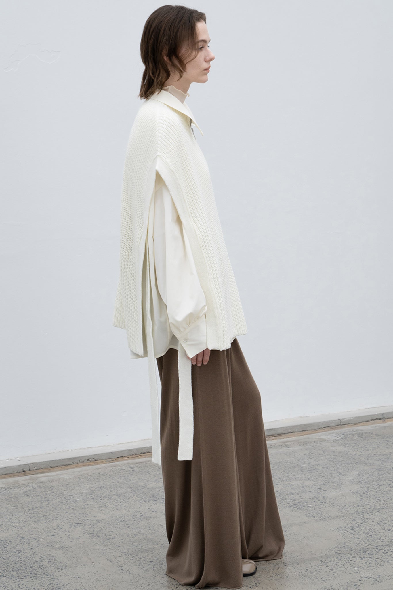 Stand collar high neck half zip up side open knit vest