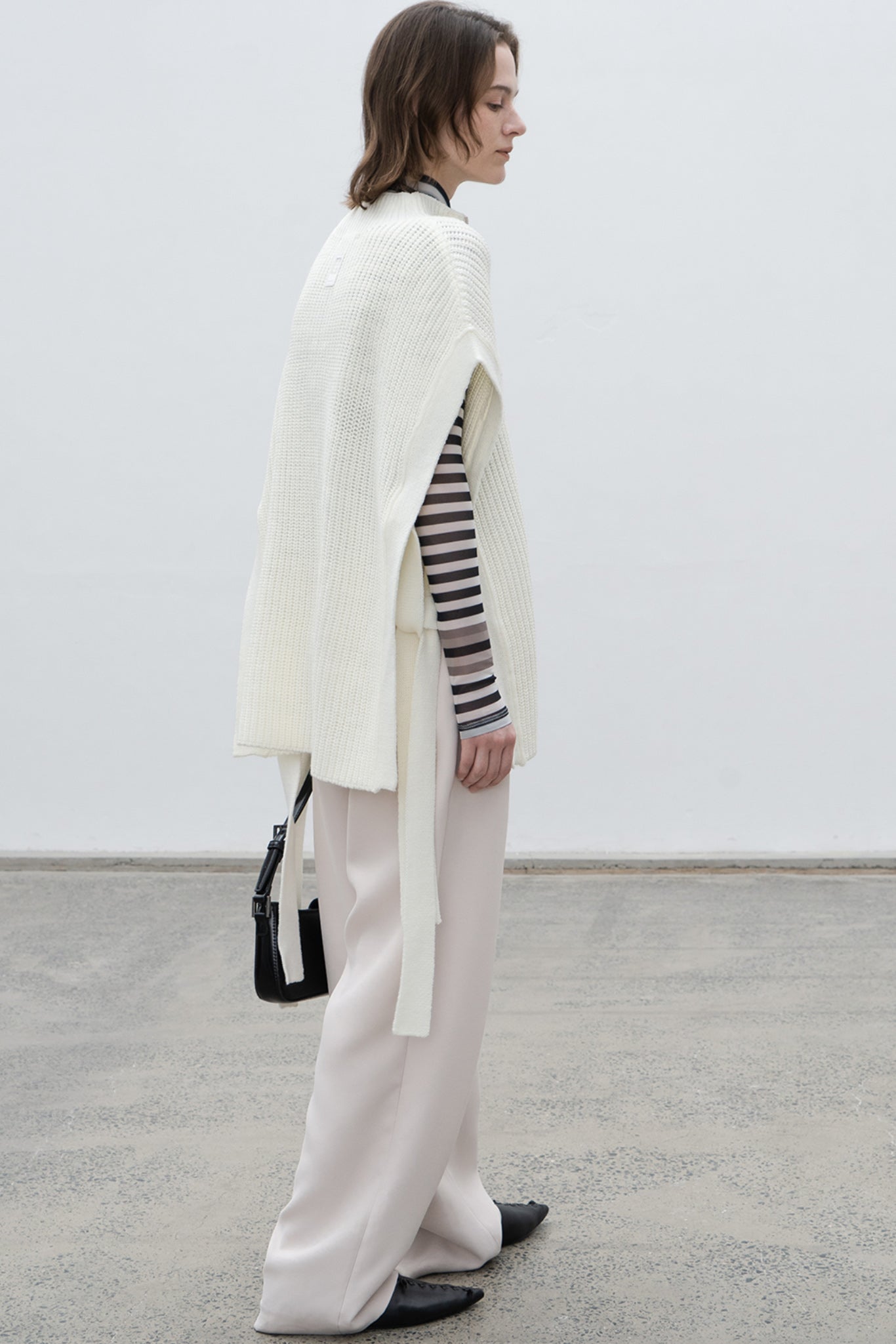 Stand collar high neck half zip up side open knit vest