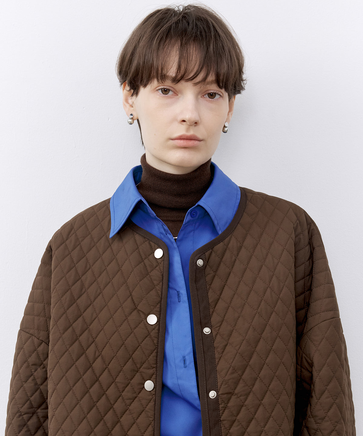 Round Hem Quilted Mid Jacket