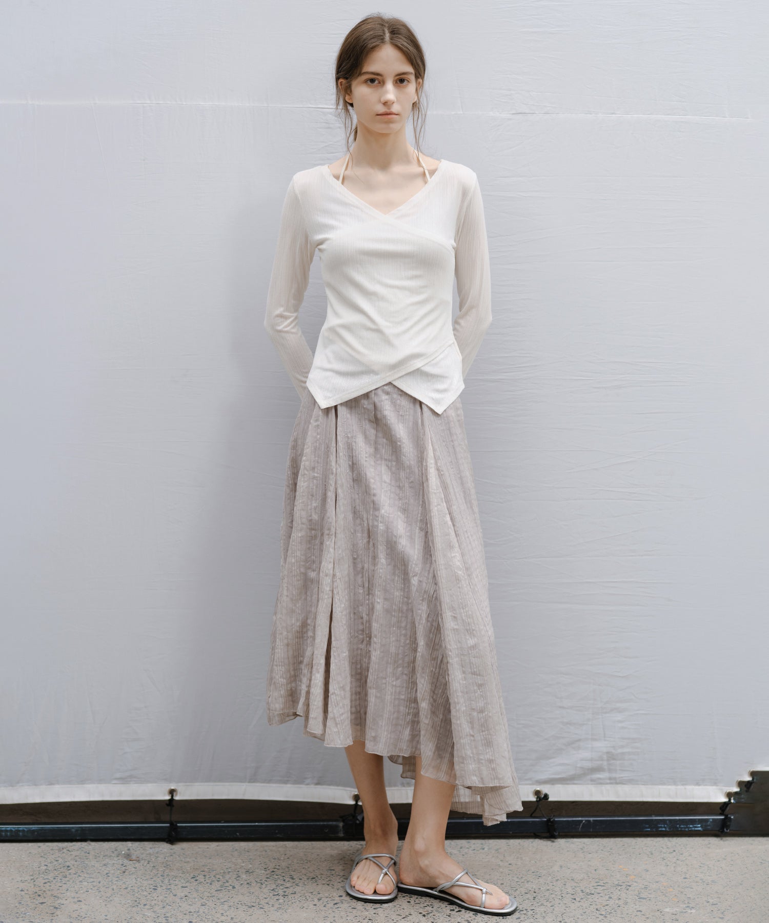 "Shipping from late February to early March" Wrap Neck Asymmetric Hem Top