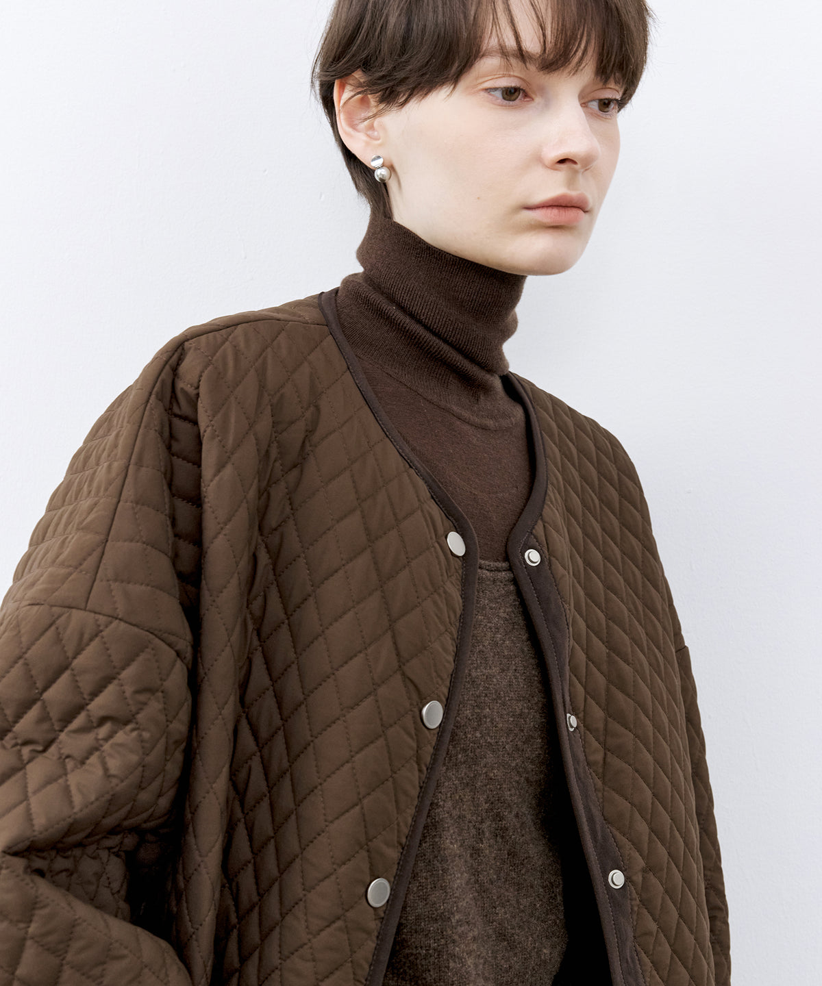 Round Hem Quilted Mid Jacket