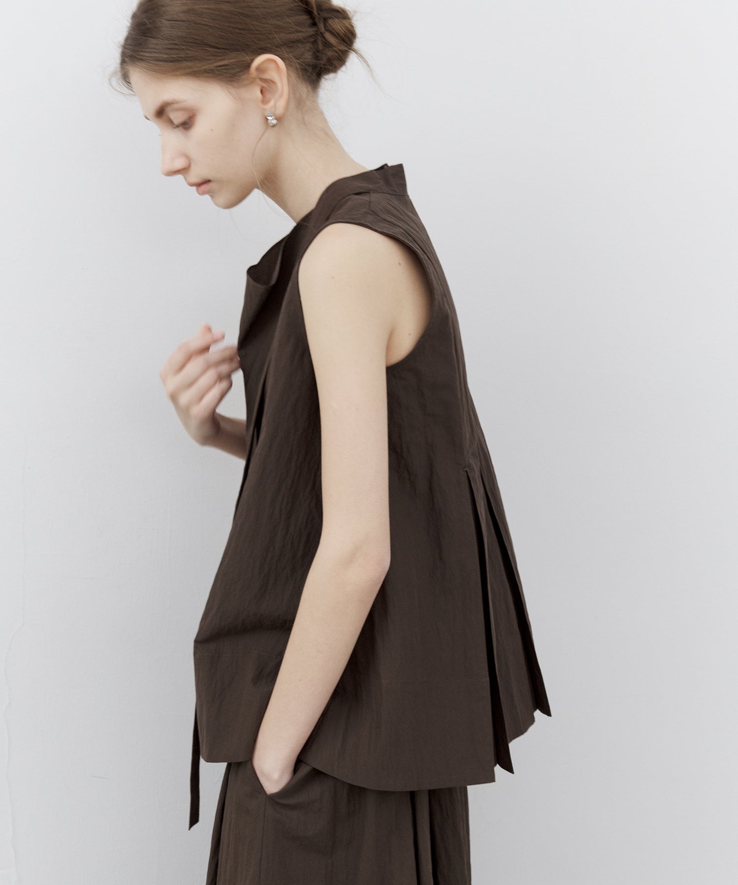 Tie-Neck Sleeveless Textured Blouse