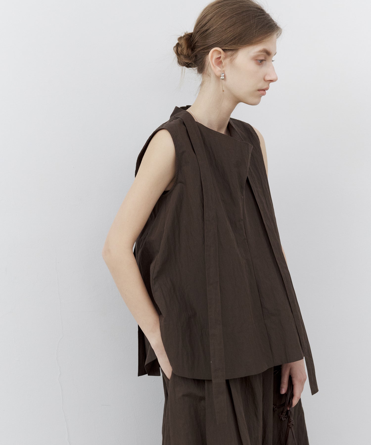 Tie-Neck Sleeveless Textured Blouse