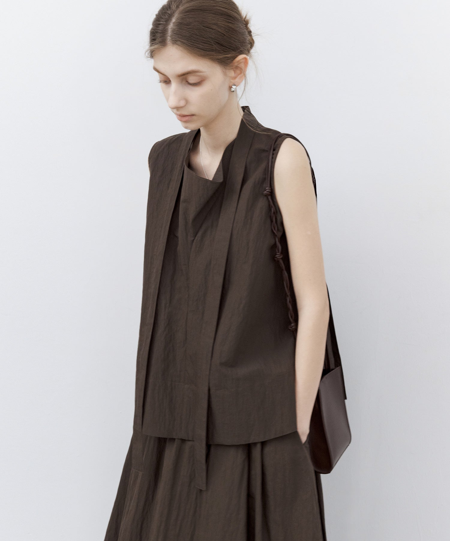 Tie-Neck Sleeveless Textured Blouse