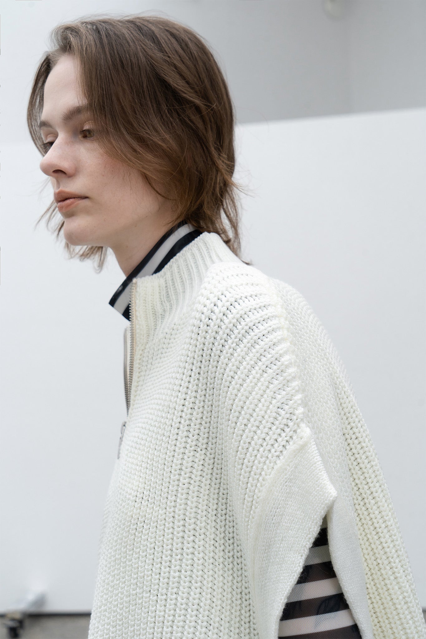 Stand collar high neck half zip up side open knit vest