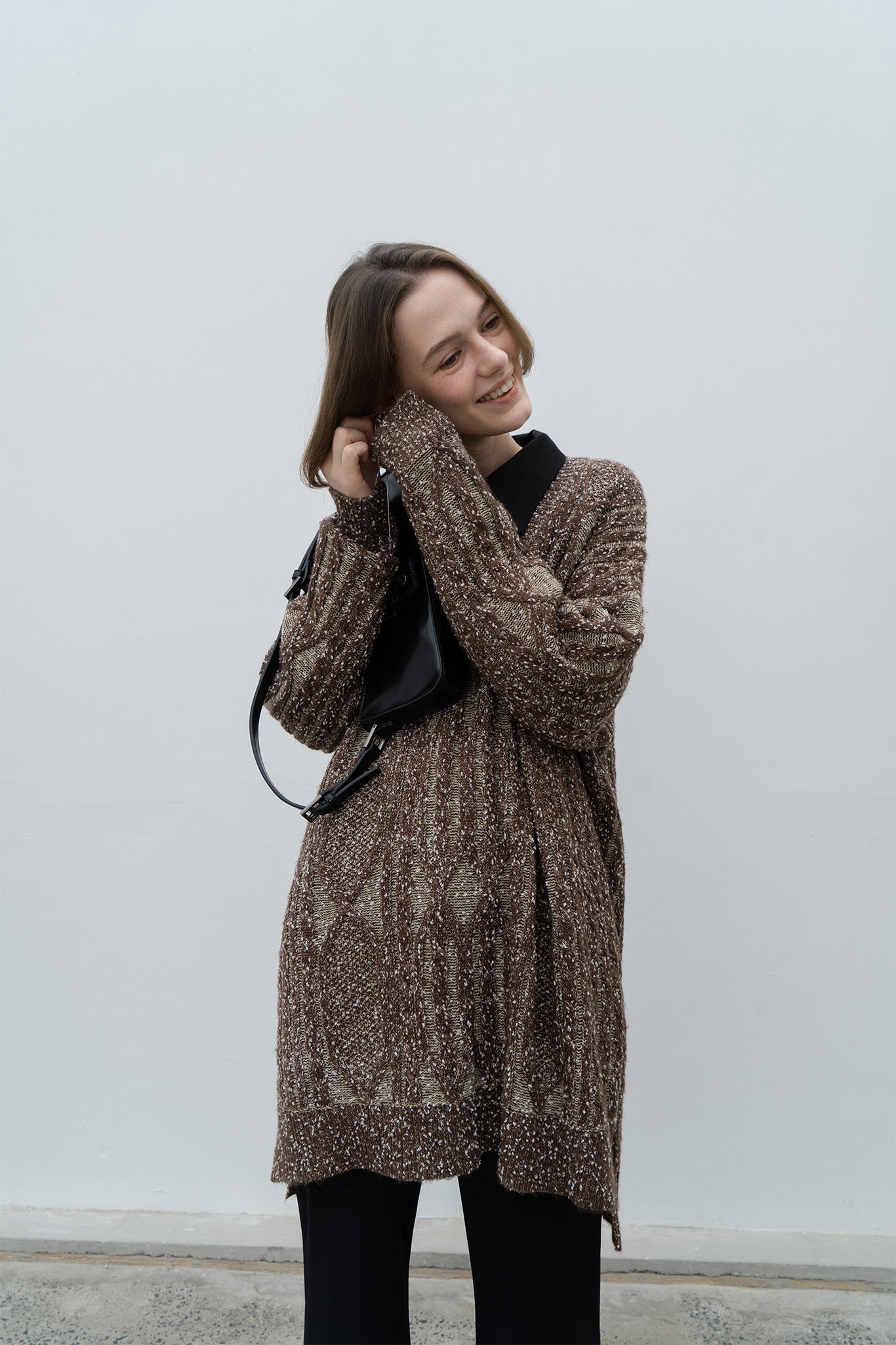 Cable-knit jacquard oversized V-neck knit top