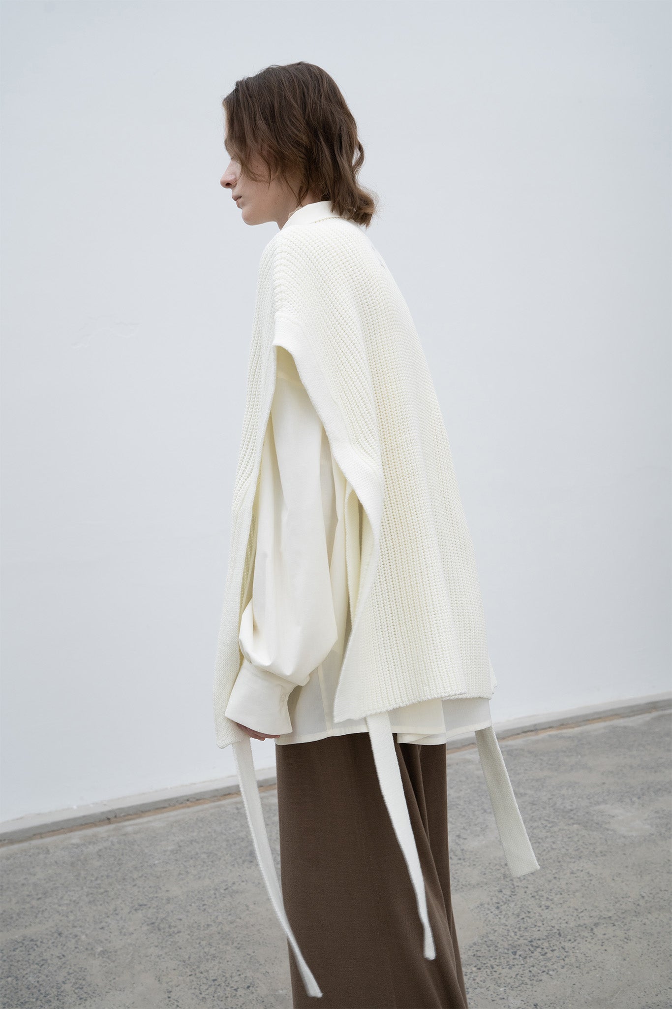 Stand collar high neck half zip up side open knit vest