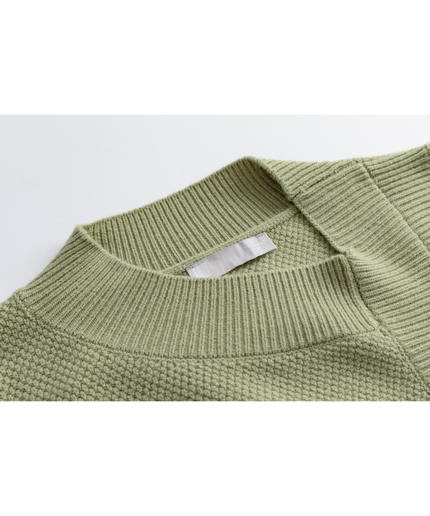 Round slit asymmetric design knit