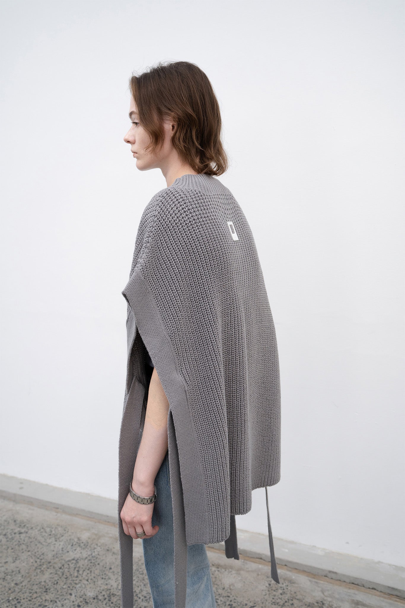 Stand collar high neck half zip up side open knit vest