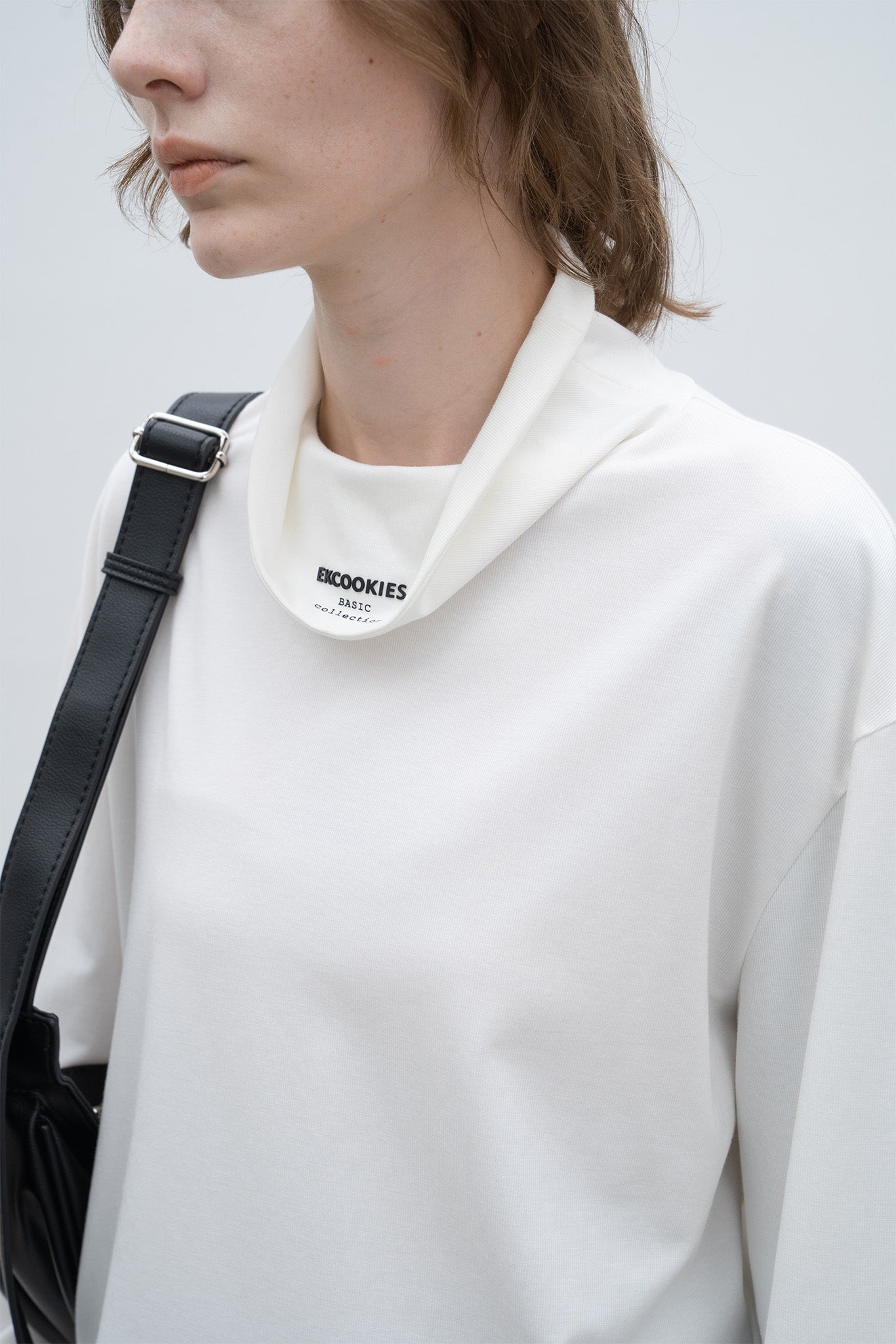 High neck long T-shirt cut-and-sew tops with logo
