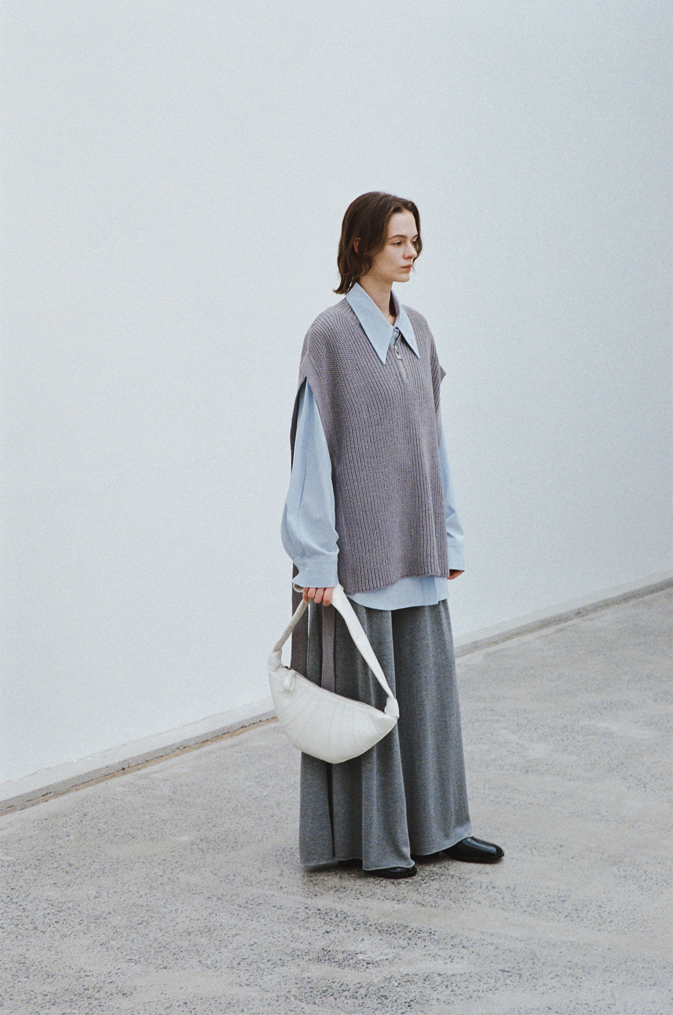 Stand collar high neck half zip up side open knit vest