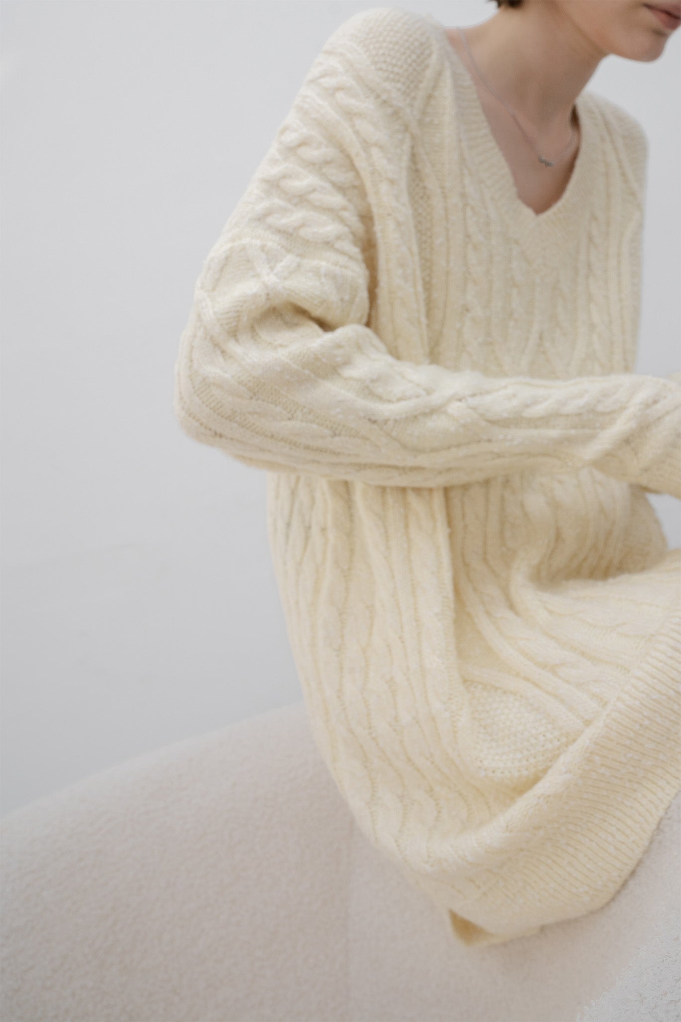 Cable-knit jacquard oversized V-neck knit top