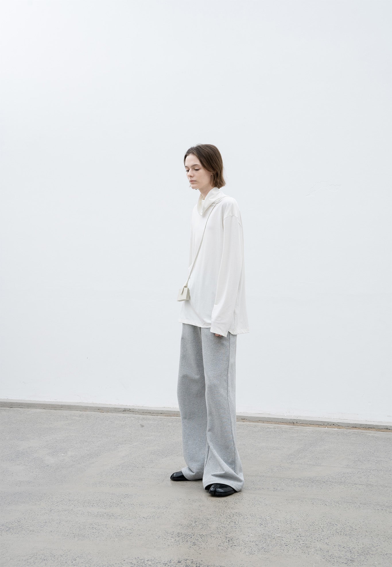 High neck long T-shirt cut-and-sew tops with logo