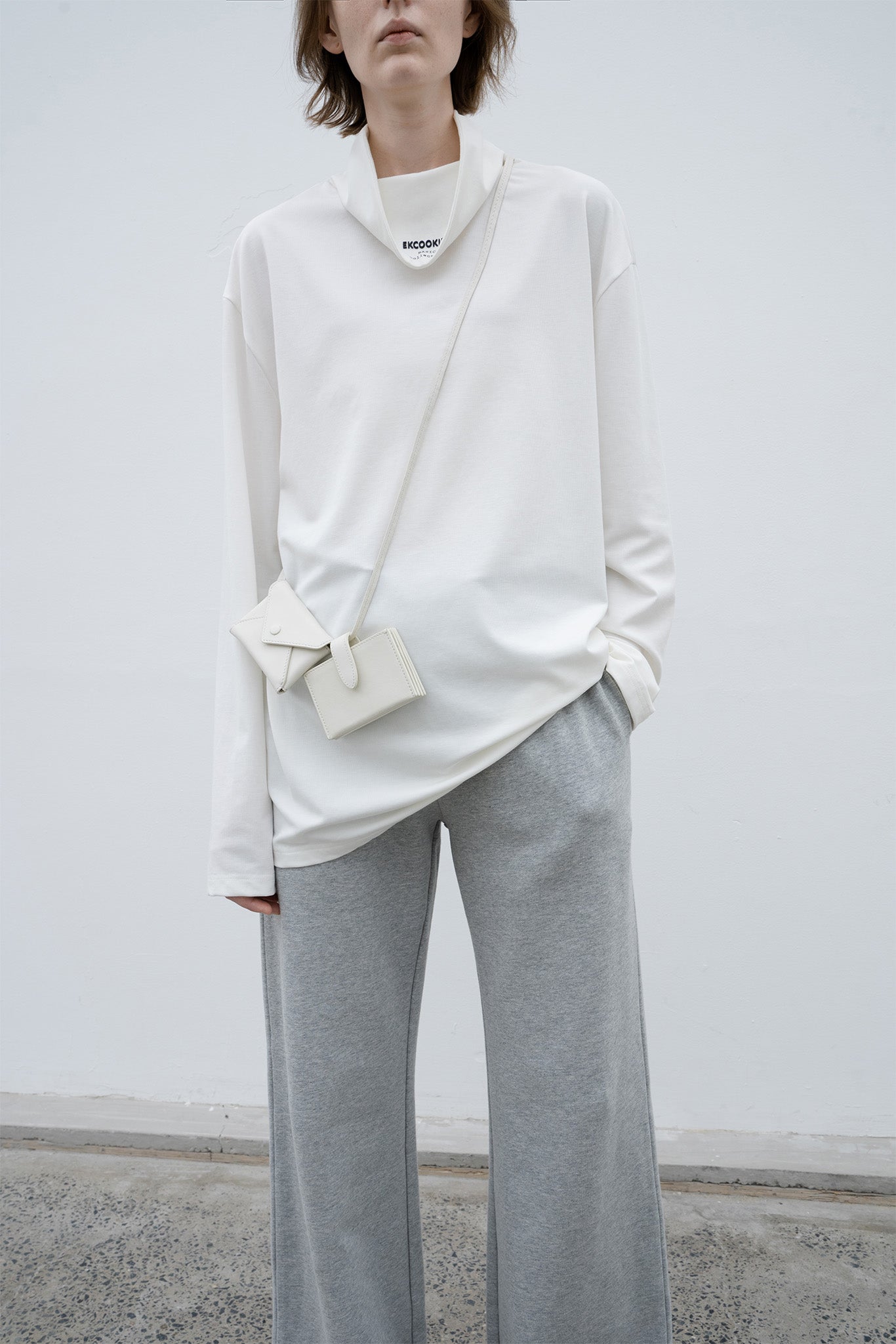 High neck long T-shirt cut-and-sew tops with logo