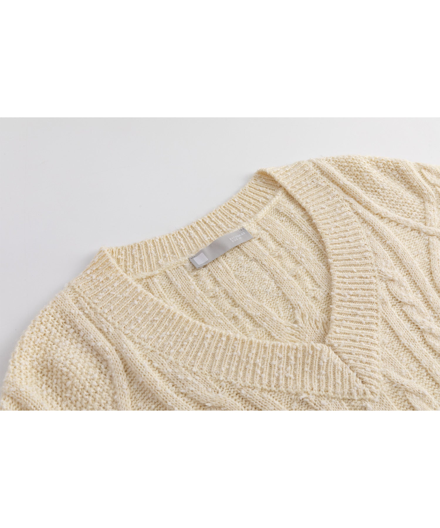 Cable-knit jacquard oversized V-neck knit top