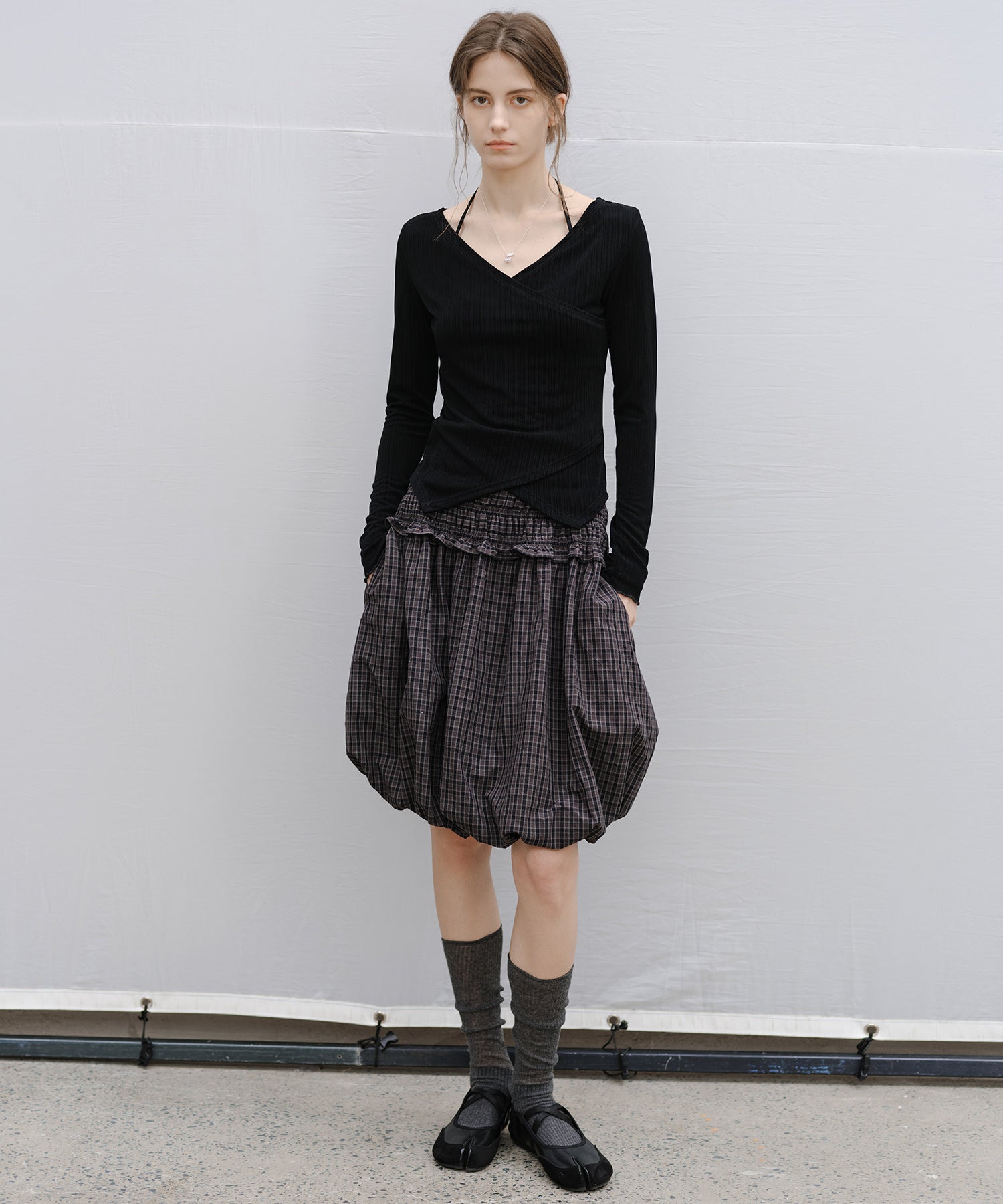 "Shipping from late February to early March" Wrap Neck Asymmetric Hem Top