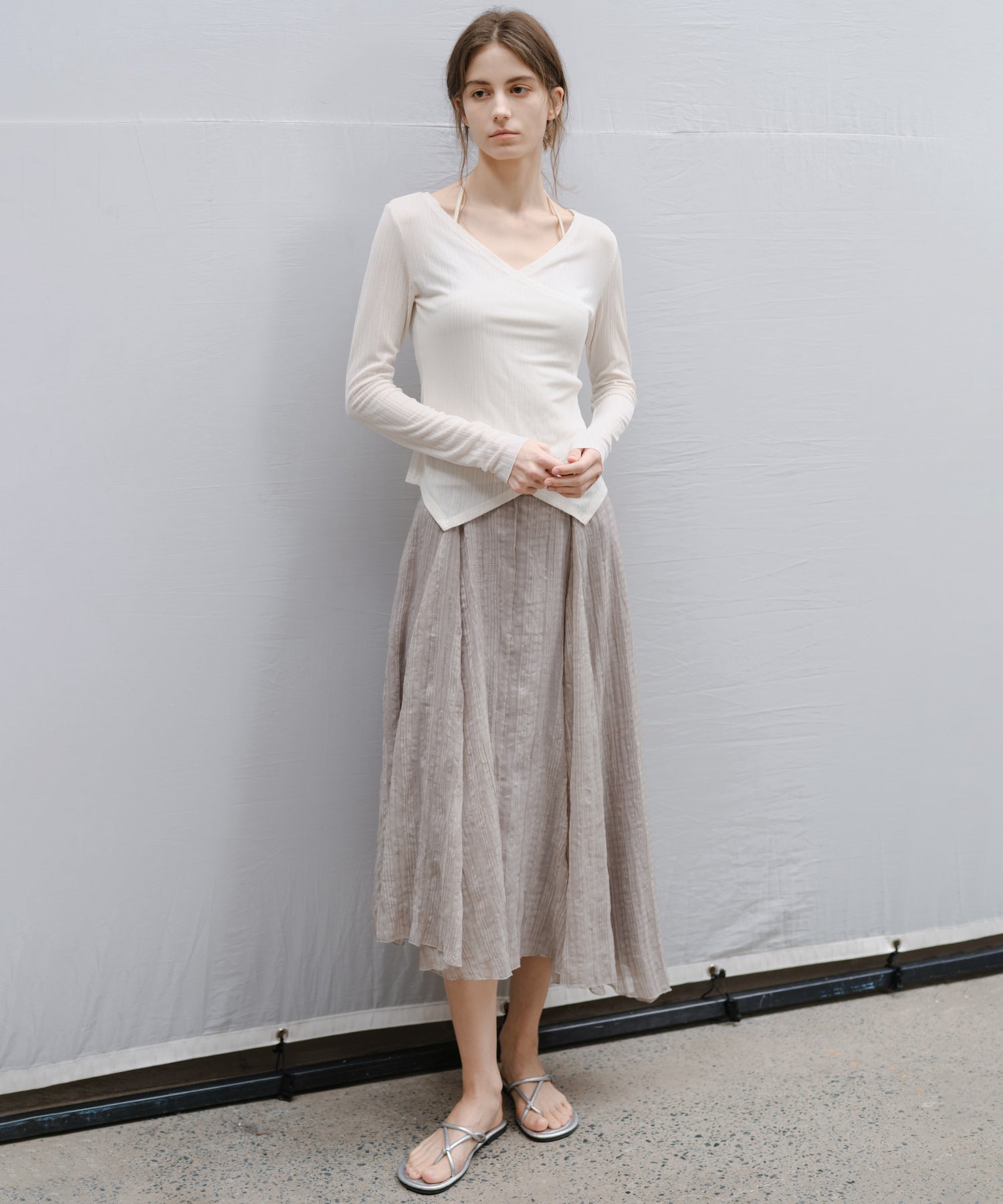 "Shipping from late February to early March" Wrap Neck Asymmetric Hem Top