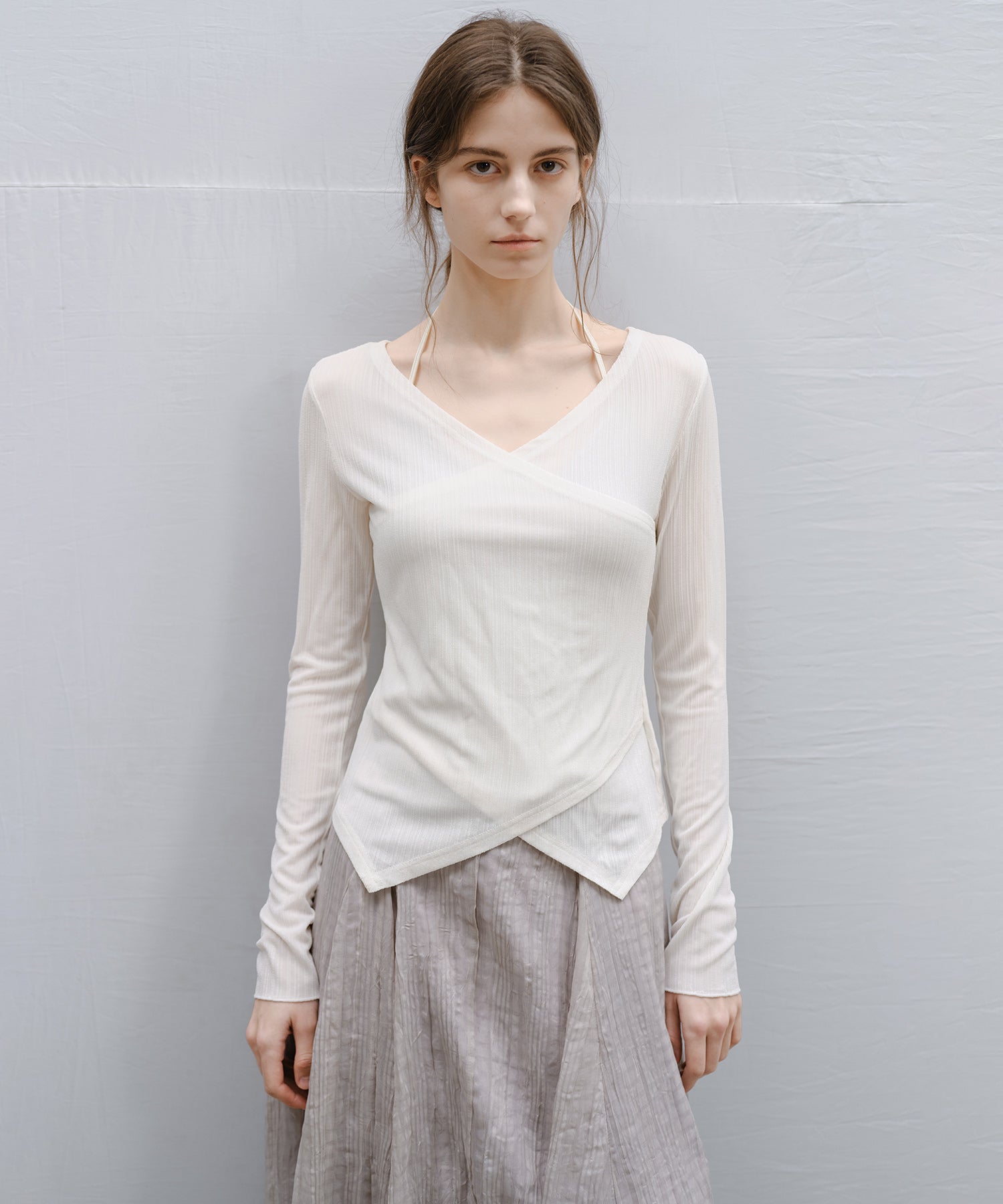 "Shipping from late February to early March" Wrap Neck Asymmetric Hem Top