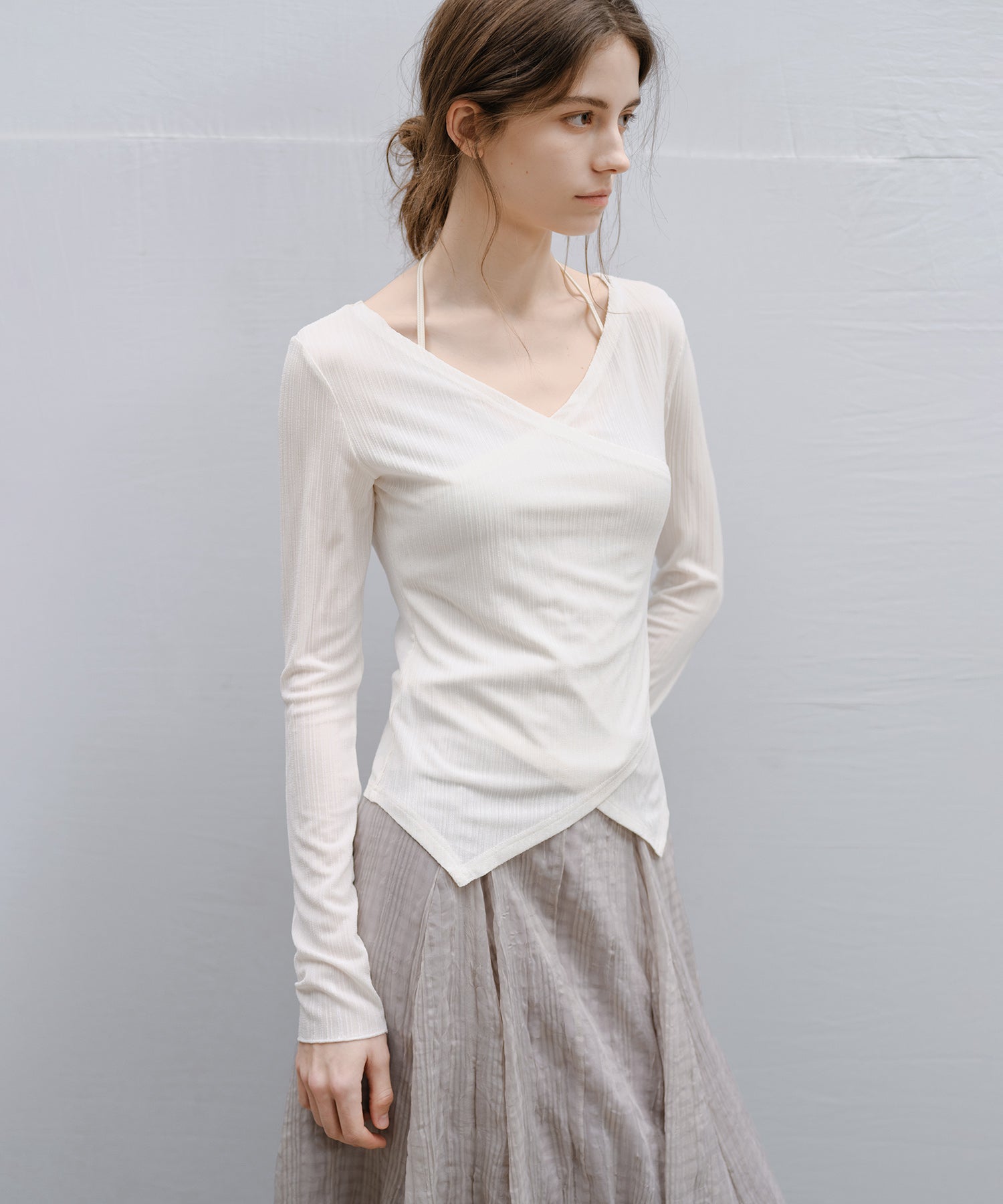 "Shipping from late February to early March" Wrap Neck Asymmetric Hem Top