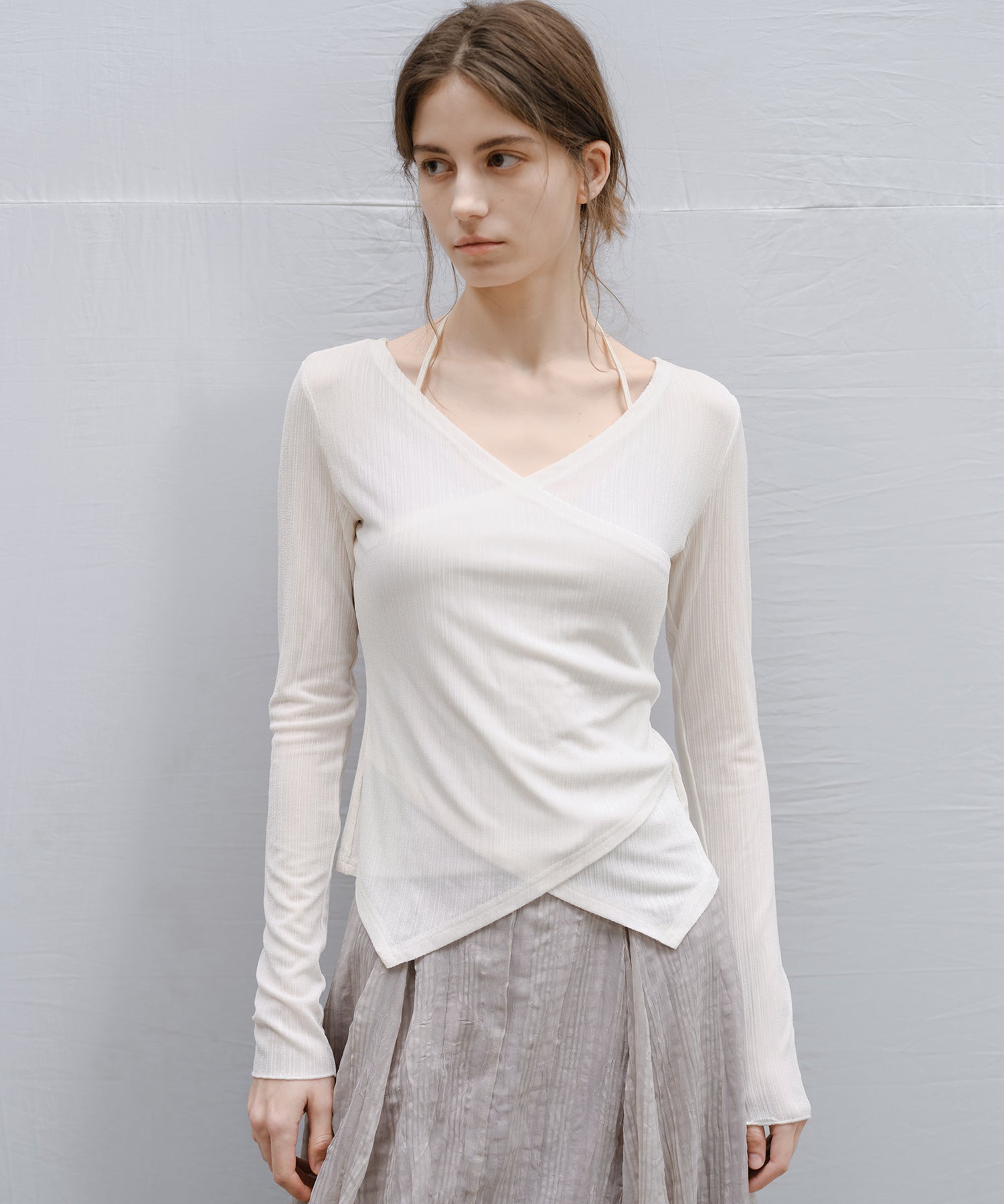 "Shipping from late February to early March" Wrap Neck Asymmetric Hem Top