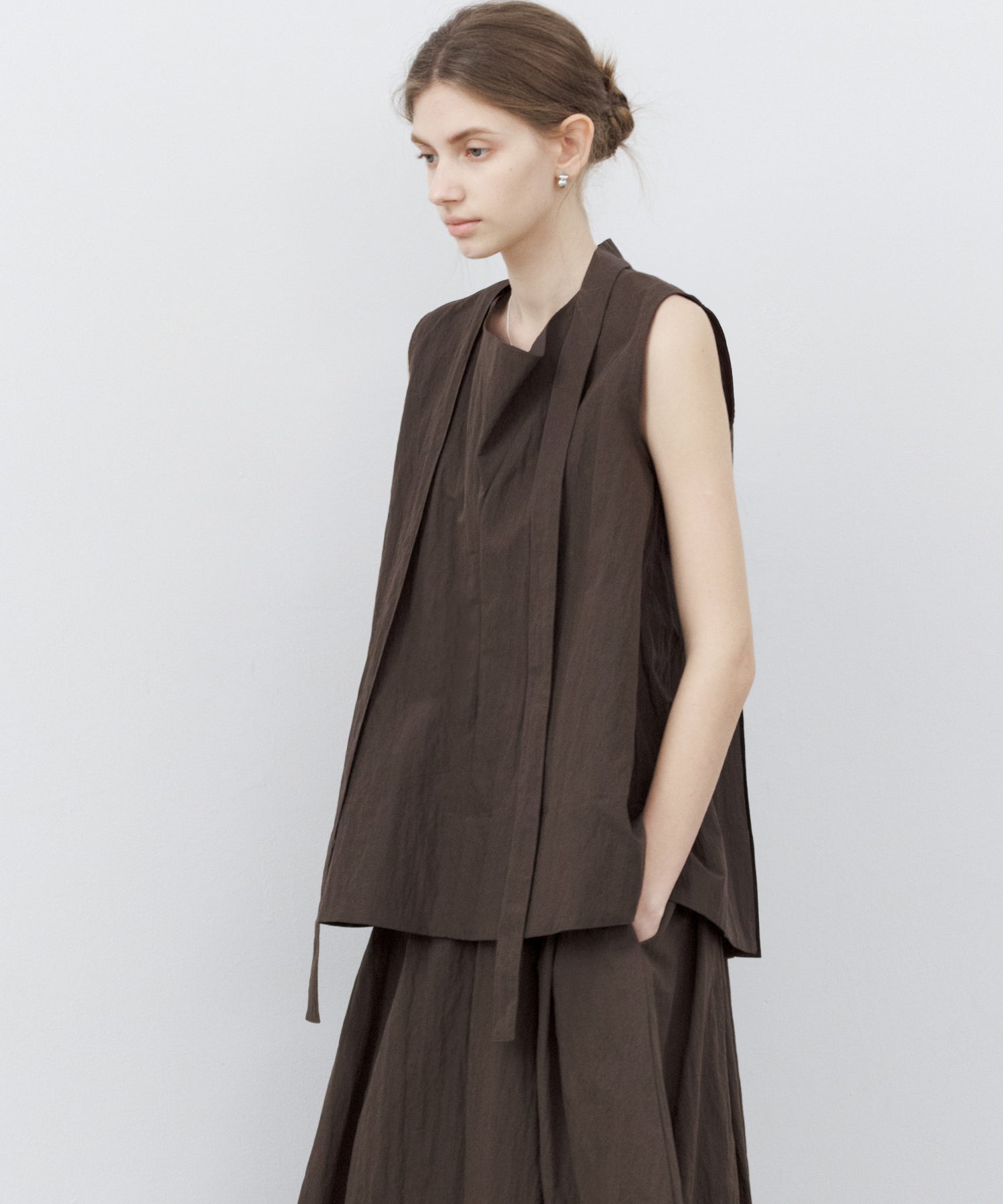 Tie-Neck Sleeveless Textured Blouse