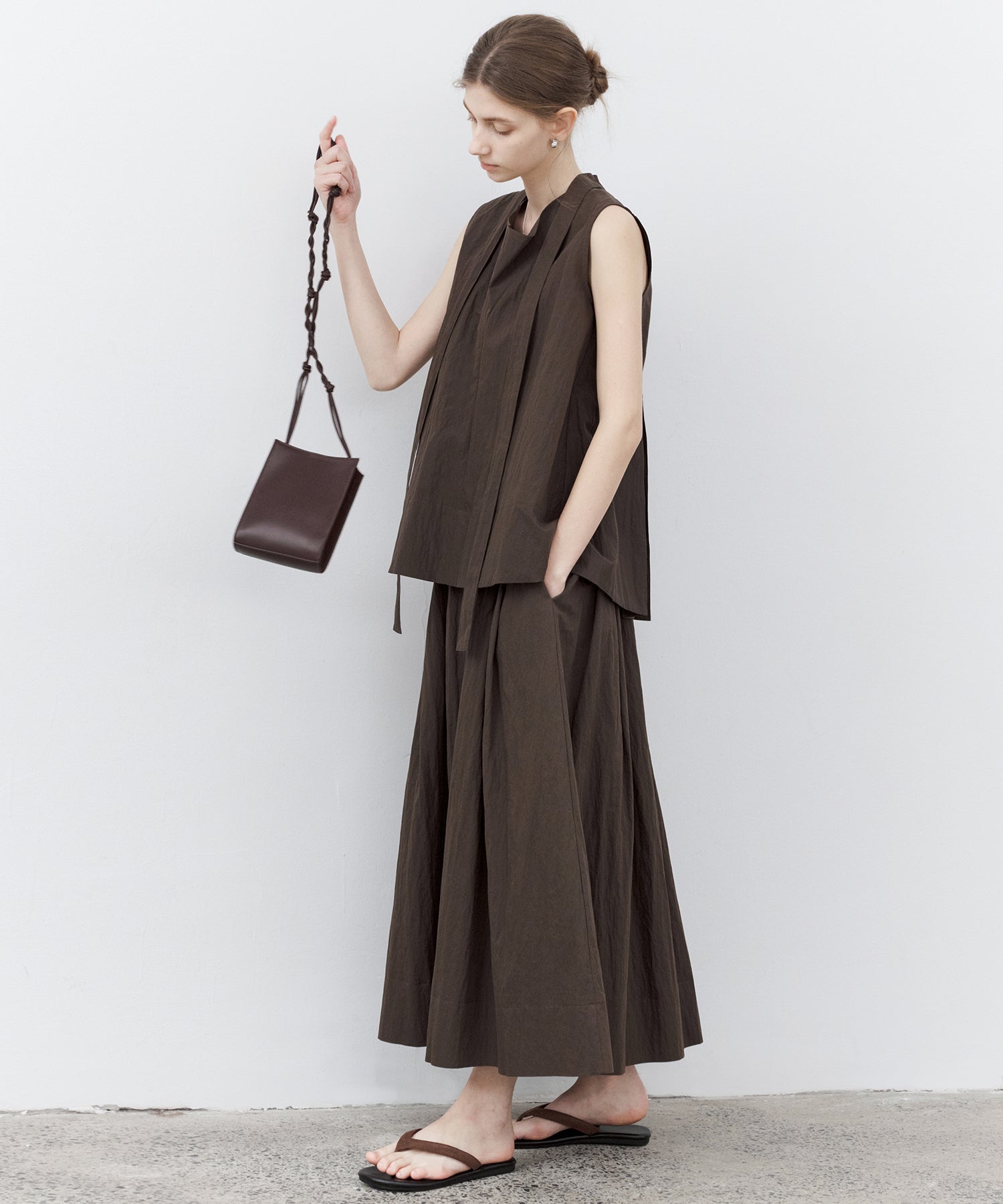 Tie-Neck Sleeveless Textured Blouse