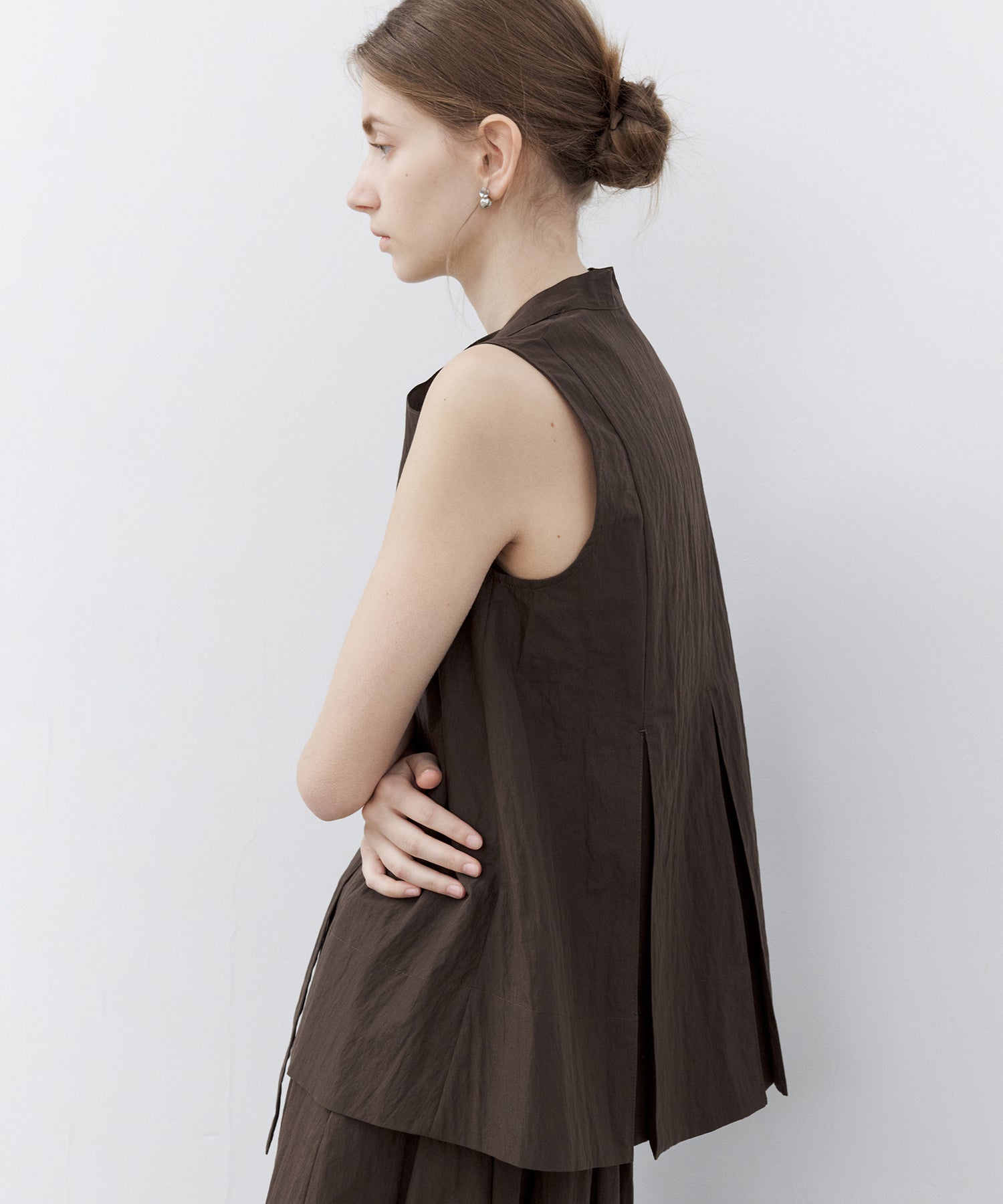 Tie-Neck Sleeveless Textured Blouse