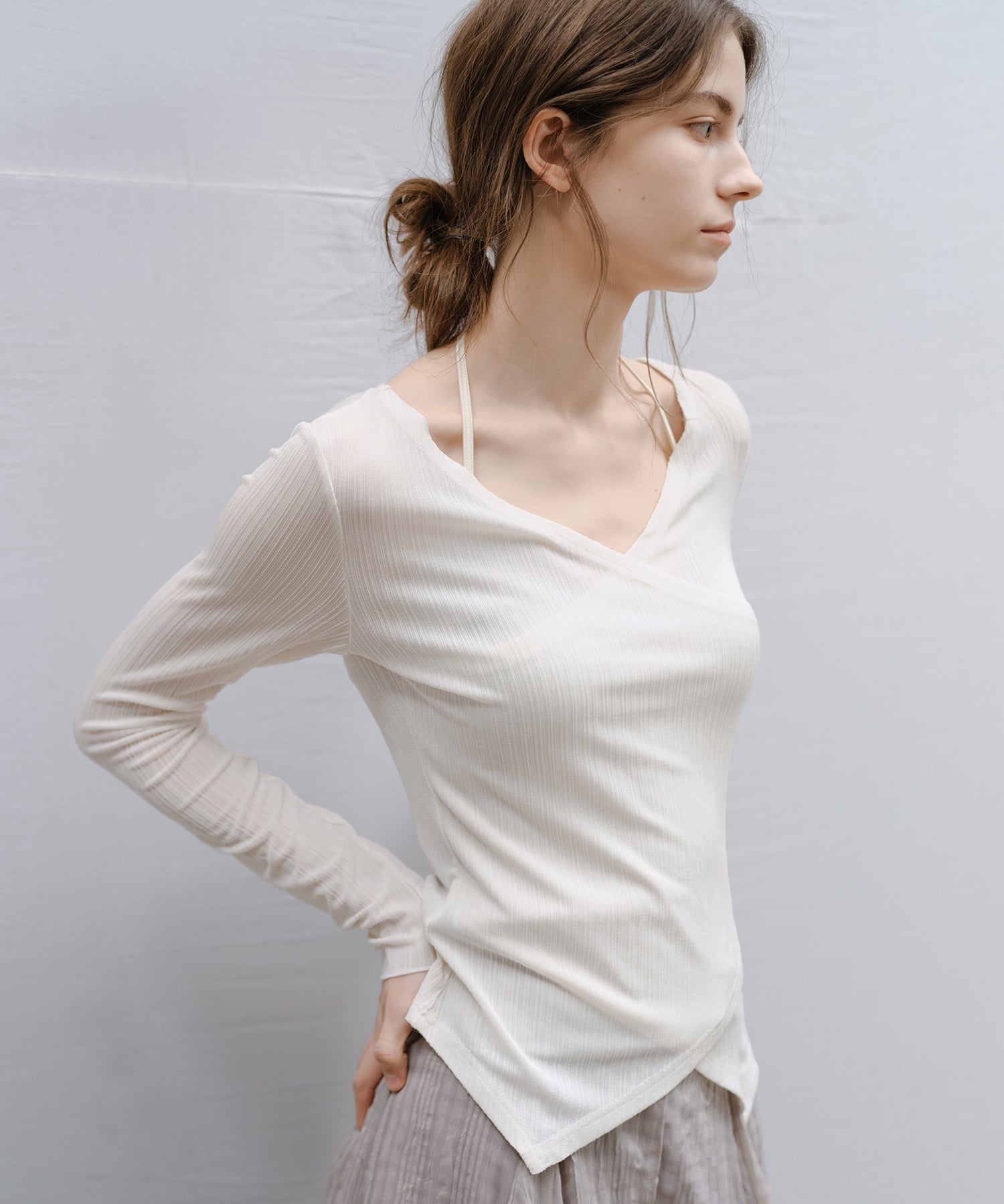 "Shipping from late February to early March" Wrap Neck Asymmetric Hem Top