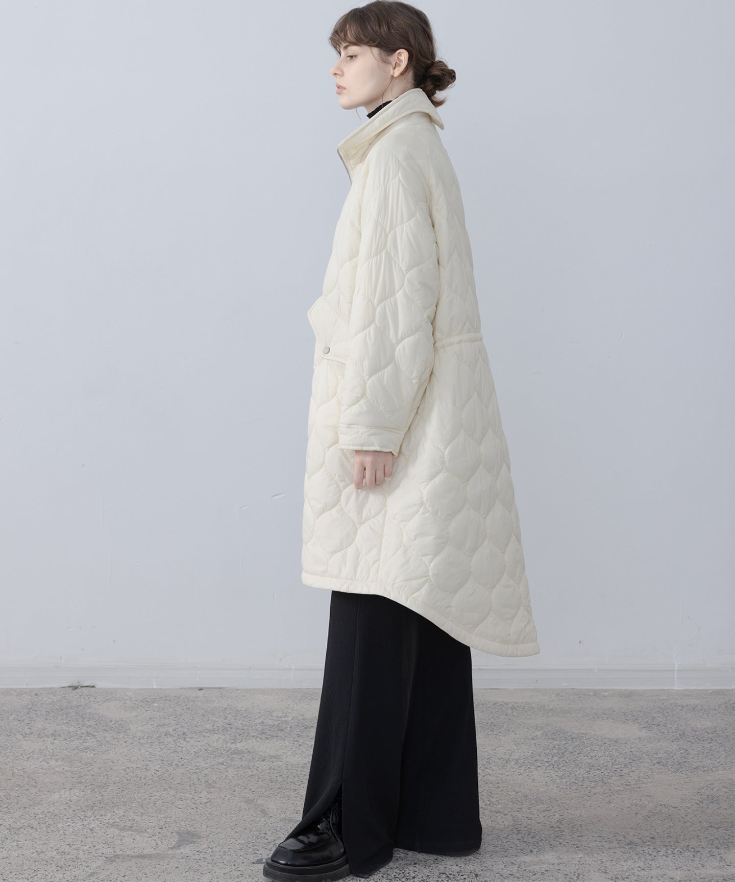 Irregular hem oversized volume quilted long coat 