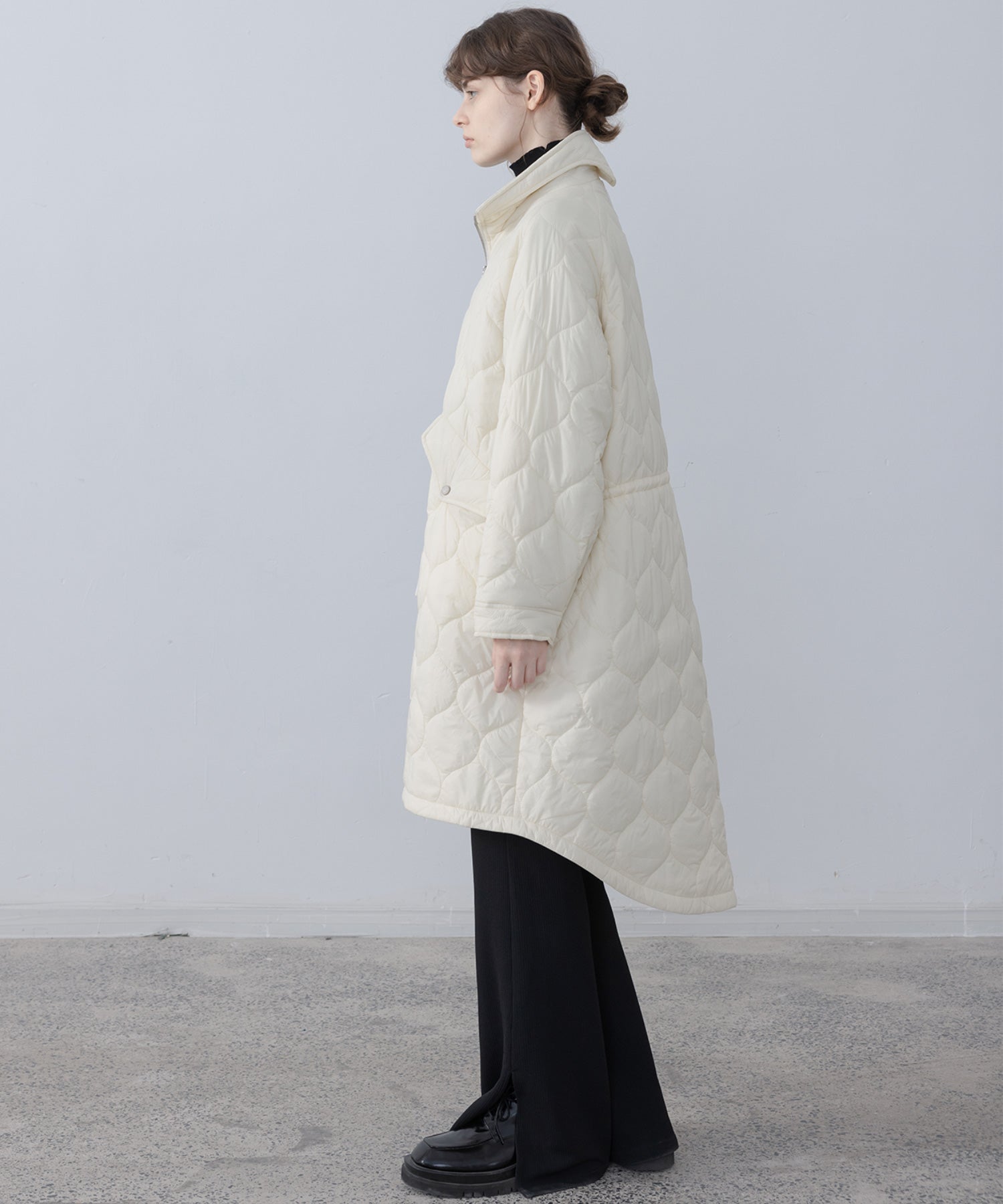 Irregular hem oversized volume quilted long coat 