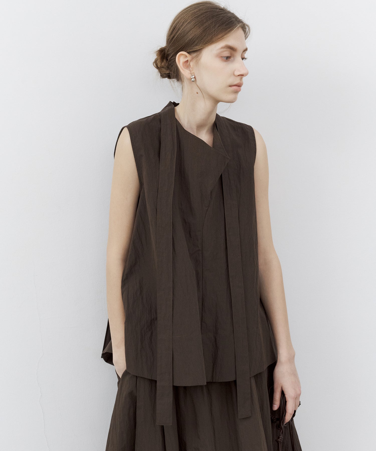 Tie-Neck Sleeveless Textured Blouse