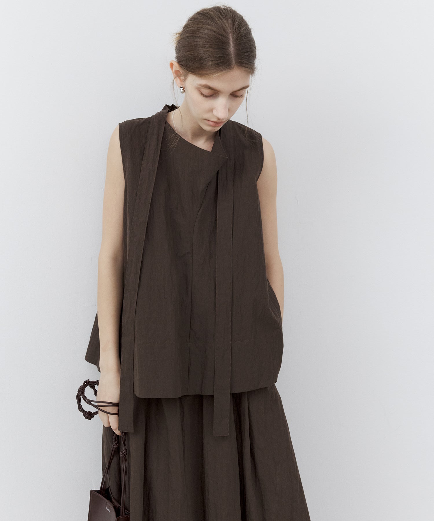 Tie-Neck Sleeveless Textured Blouse