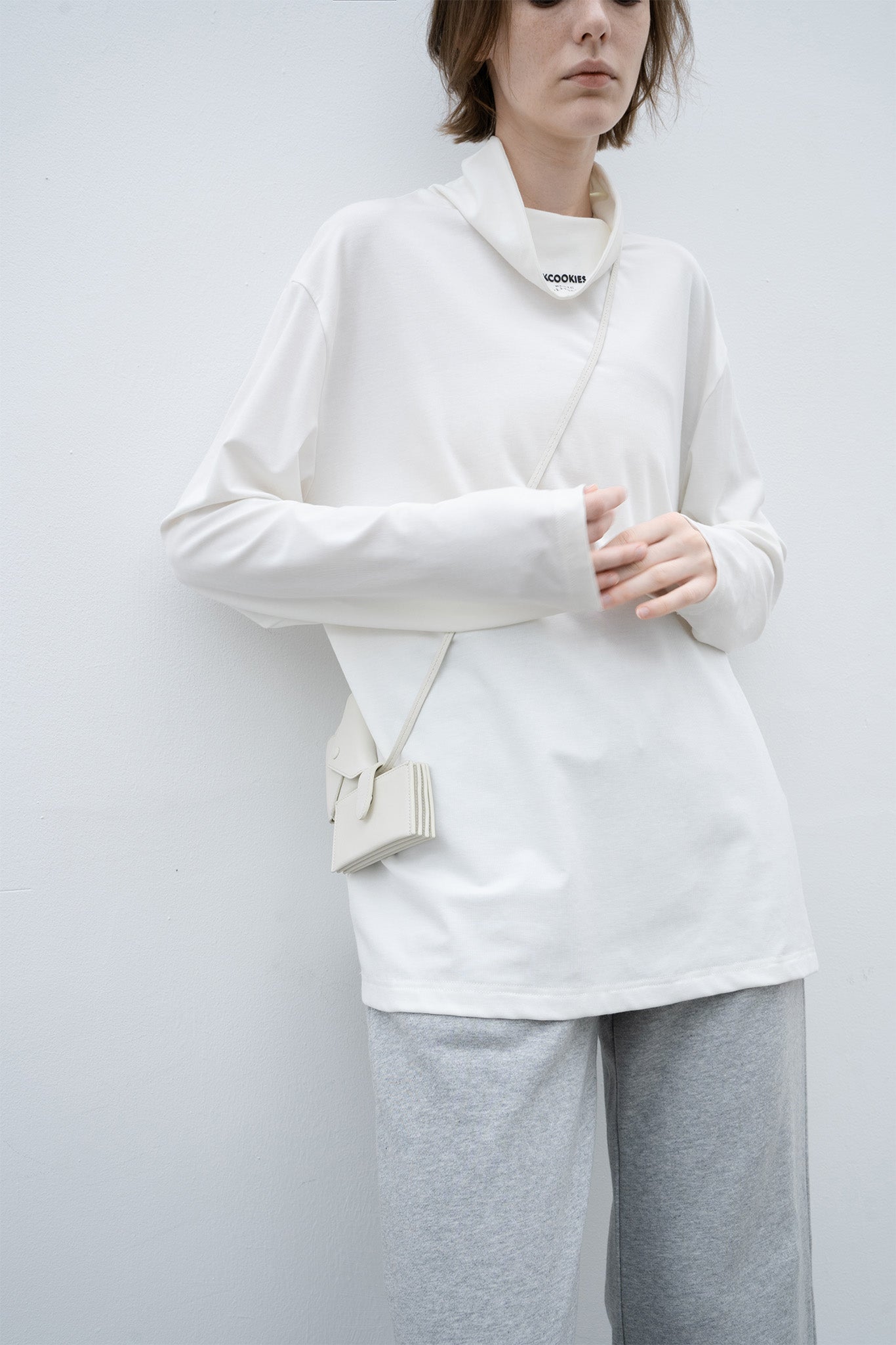 High neck long T-shirt cut-and-sew tops with logo 